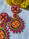 Pink Swastik Beaded Earrings