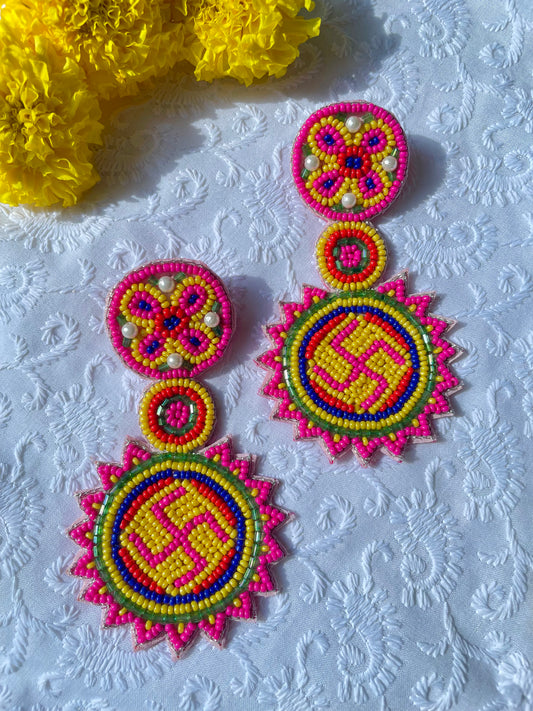Pink Swastik Beaded Earrings