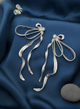 Silver Ribbon Statement Earrings