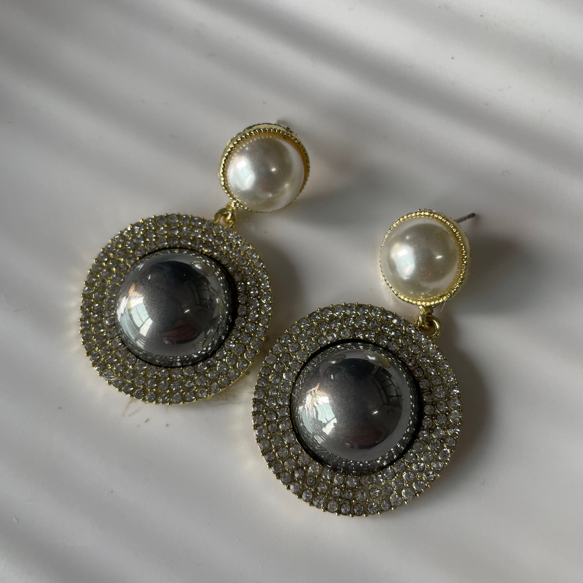 Delicate pearl drop earrings online