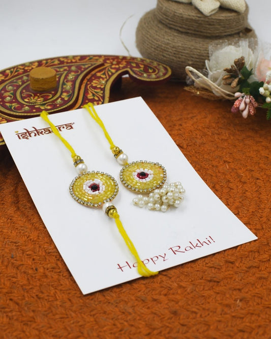 Yellow Evil Eye Bhaiya Bhabhi Rakhi Combo