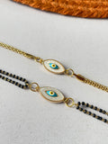Bhaiya Bhabhi Goldeye Rakhi Combo