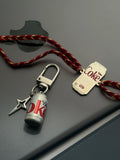 Diet Coke Rakhi & Bag Charm Combo